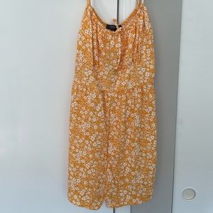 Orange/yellow floral romper (never worn)